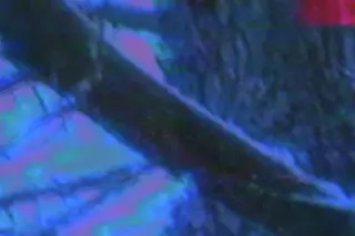 Distorted VHS frame from Le 26ème Passage