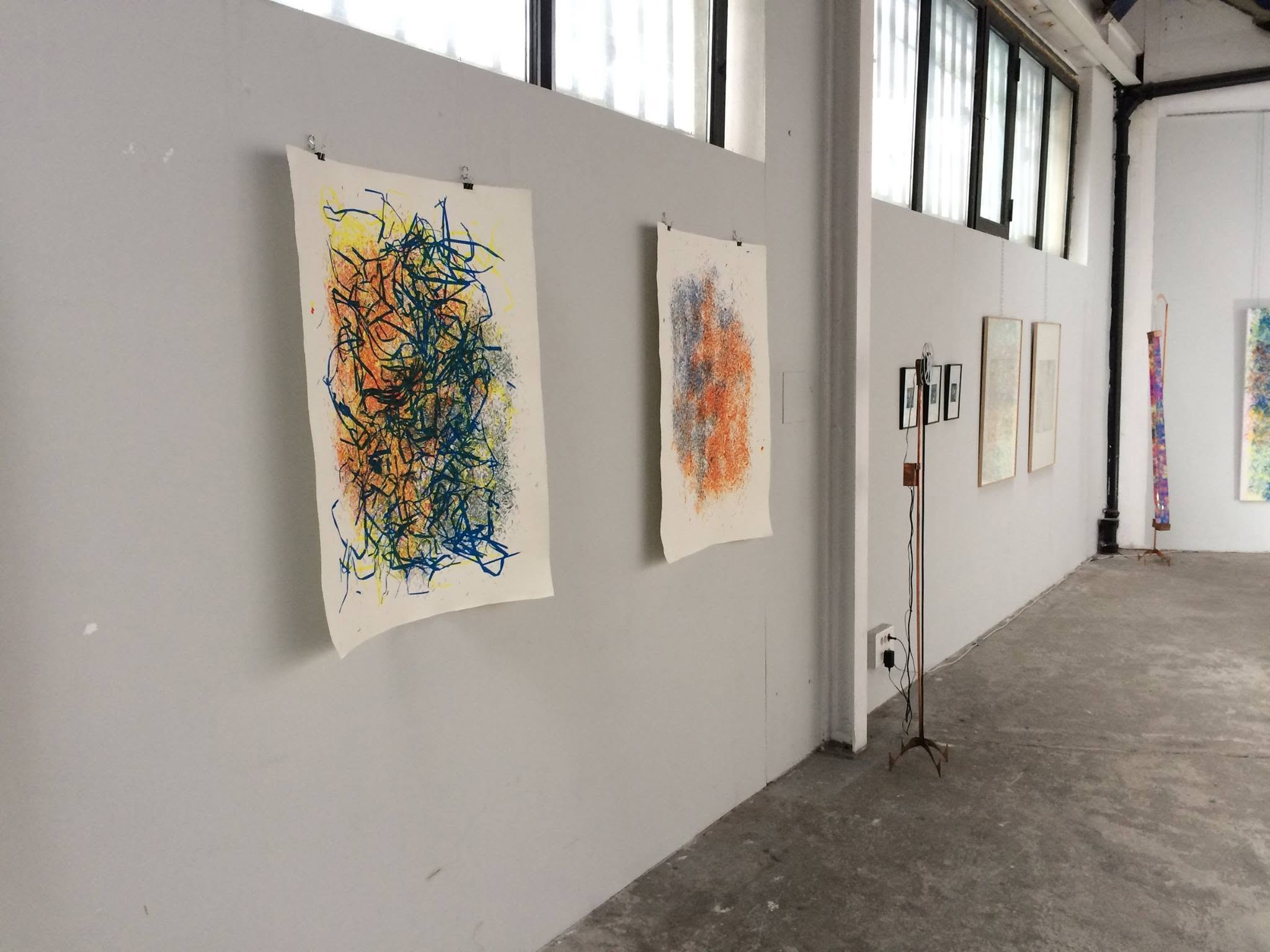 Réminiscences exhibition wall with framed works