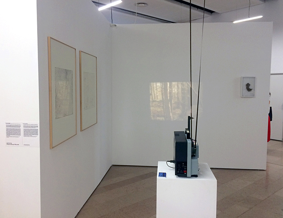 Installation detail with projected image and material elements
